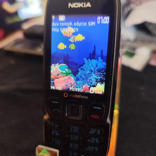 Nokia 6303 Classic phone used, black, with charger