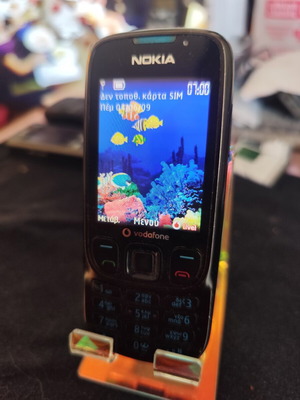 Nokia 6303 Classic phone used, black, with charger