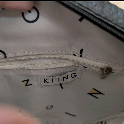 Kling crossbody bag like new, fish-shaped, black
