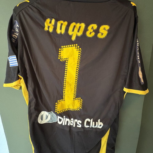 AEK football jersey from championship game, brown