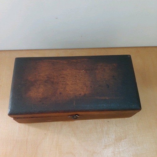Wooden box with bronze weights used
