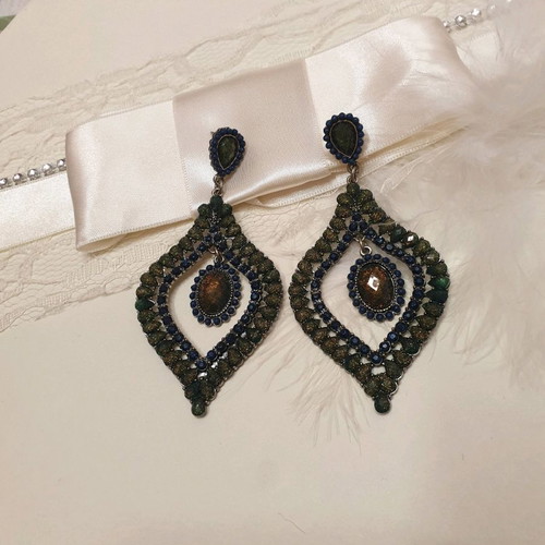 Green earrings like new with stones, large and impressive
