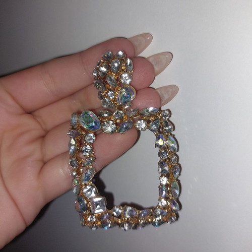 Long shiny earrings used