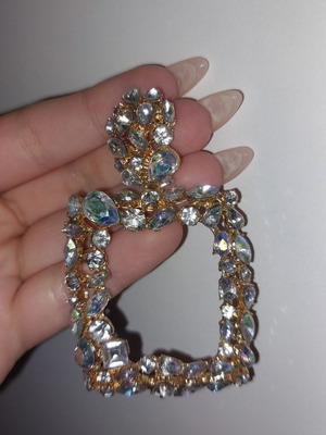 Long shiny earrings used