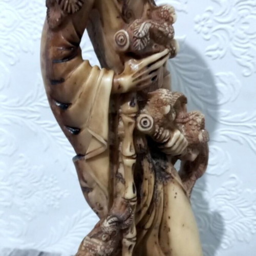 Decorative tabletop statue of Asian man like new