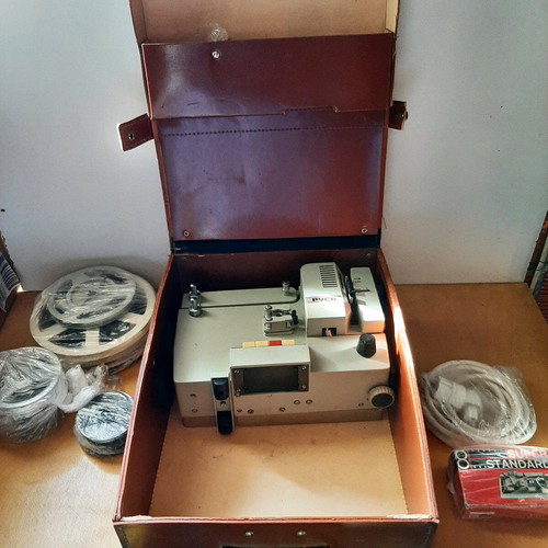 Russian projector used with leather case and film