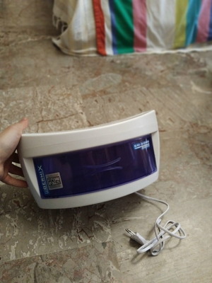Germix SM-504B UV tool sterilizer like new, white with blue drawer