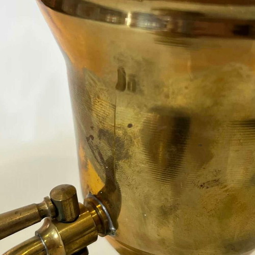 Vintage brass amphora with tap and lid, rustic decoration