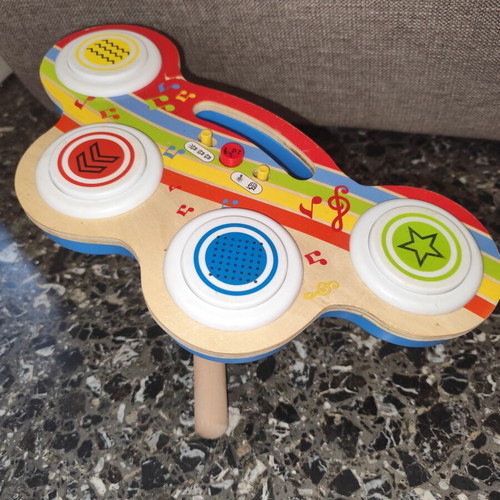 Wooden drum toy with music used