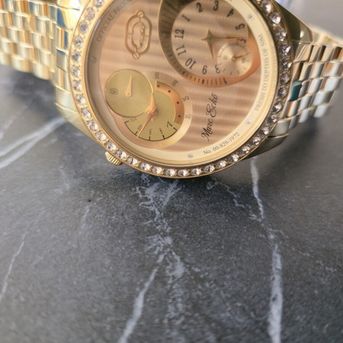 Marc Ecko gold-tone wristwatch with crystal bezel