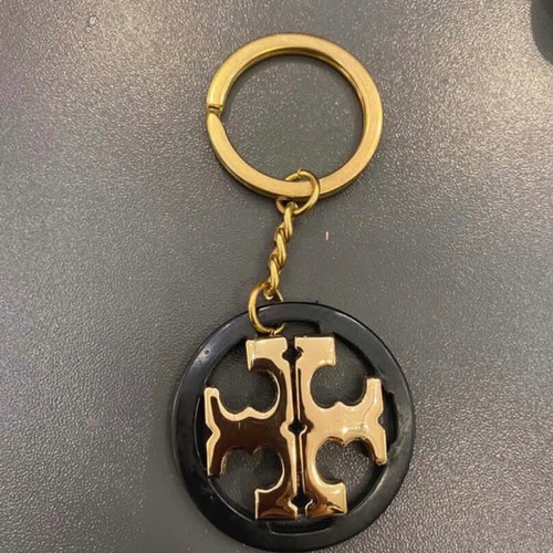 Tory Burch keychain like new, black and gold