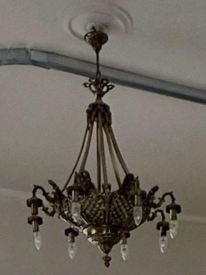 Bronze chandelier with intricate beadwork design