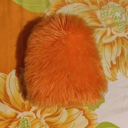Orange dog plushie like new, very soft