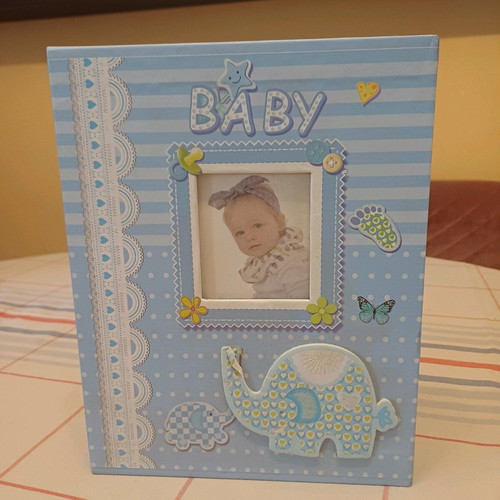 Photo album for boy like new, A4 size, 100 photos capacity