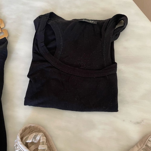 Pack of three shirts like new, two black and one semi-transparent sand color