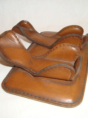 Vintage pipe stand for two tobacco pipes used, genuine leather