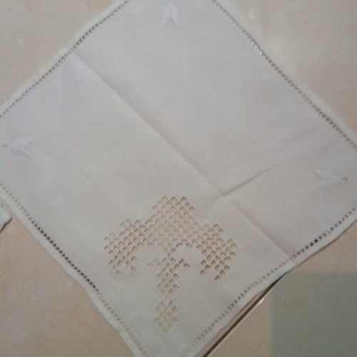 Handmade white table linen set with one large and two small doilies