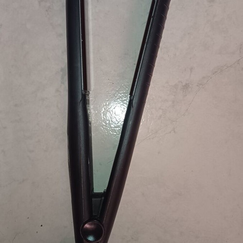 Remington S6595 hair straightener with ceramic plates