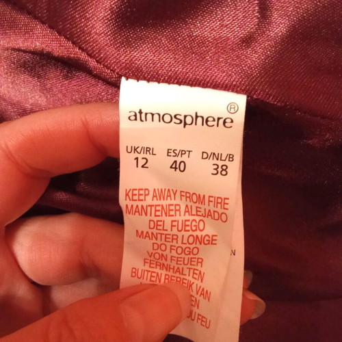 Beige coat with burgundy size medium like new