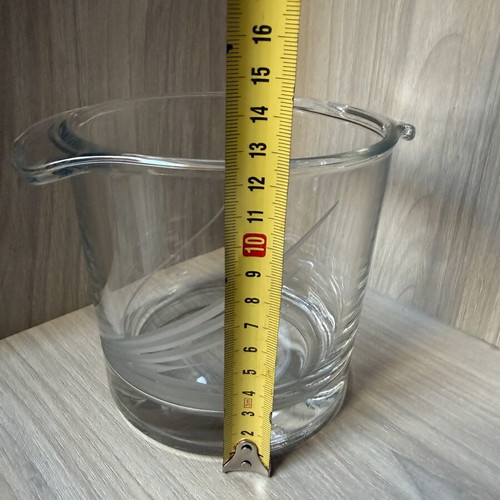 Glass ice bucket like new with handles and decorative matte engraving