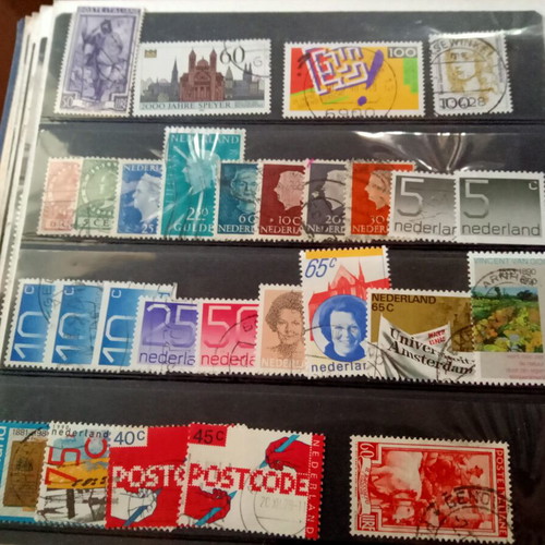 Stamp album with some stamps, mostly cancelled