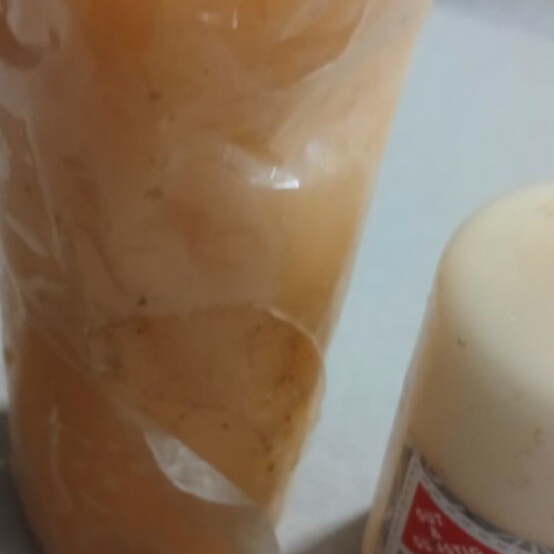 Set of 2 new candles, one with small dent
