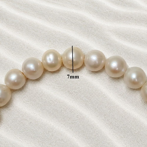 Handmade bracelet with stainless steel chain and cultured pearls