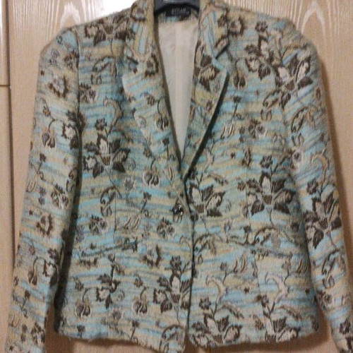 Fabric jacket used with multicolor patterns, wool blend