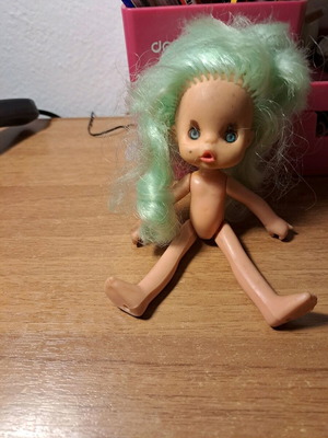 Doll used with cut hair