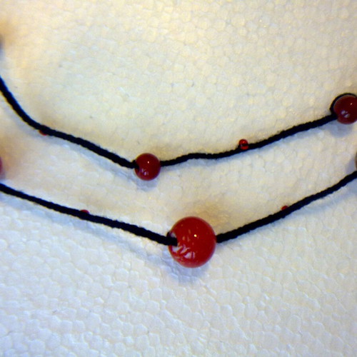 Double necklace 38cm with red glass beads on black cord