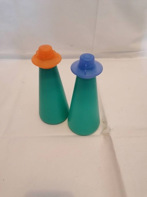 Vintage Tupperwear containers used for vinegar and oil