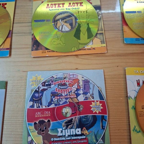 Collection of 10 children's animated DVDs with cases, dubbed