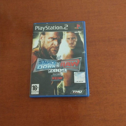 Smack Down Vs Raw 2009 PS2 like new