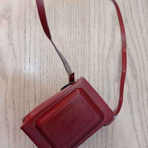Lubitel 2 camera used with brown leather case