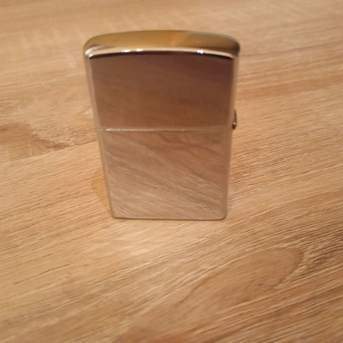 Oil lighter used carved with skull design