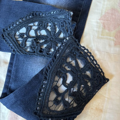 Dark blue skinny jeans with black lace and distressed details, size S, like new