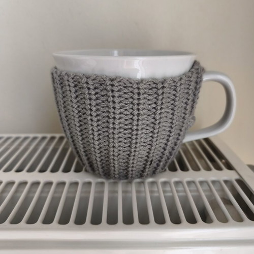 Butlers mug with knitted cover, like new, white and grey