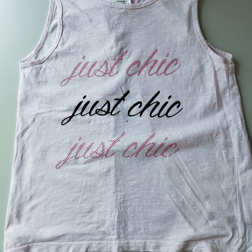 Soft pink sleeveless top like new, 100% cotton, size 14, ages 12-14