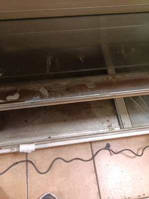 Heated countertop display case used for cheese pies