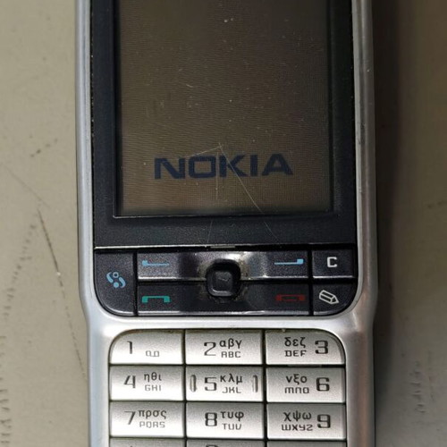 Nokia 3230 RM-51 mobile phone used, non-functional, with charger