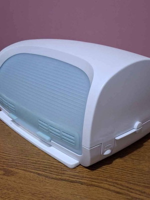 Tupperware bread box new with integrated cutting board