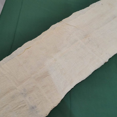 Wool woven bed sheet used with stain and wear from 1930 era