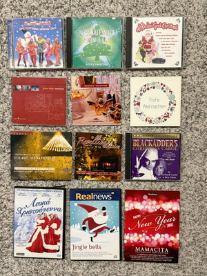 Large Christmas pack 12 CDs and DVDs like new with festive music and movies