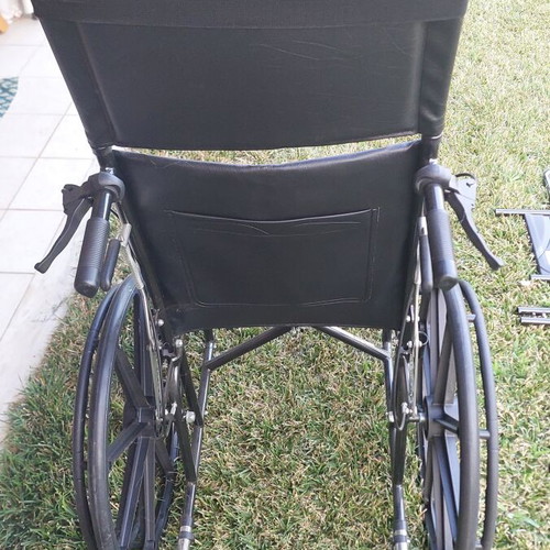 Wheelchair with adjustable reclining backrest and cushion