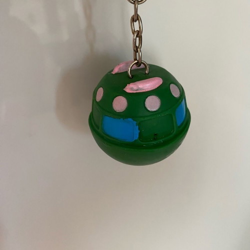 Vintage UFO keychain inflatable flying saucer like new, green