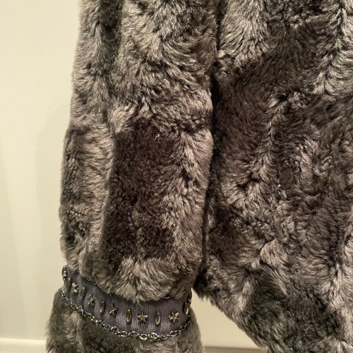 Faux fur gray small like new with design on sleeve and shoulders