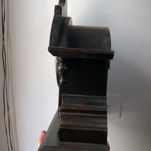 Wooden vintage table clock used, functional quartz