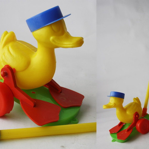 Plastic wheeled vintage 70's duck toy new with stick