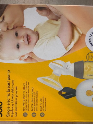 Medela electric breast pump with extra flange size like new