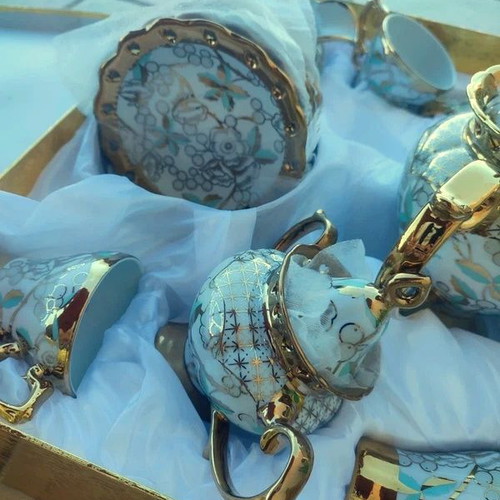 Porcelain tea and coffee set new, luxury with gold and floral details